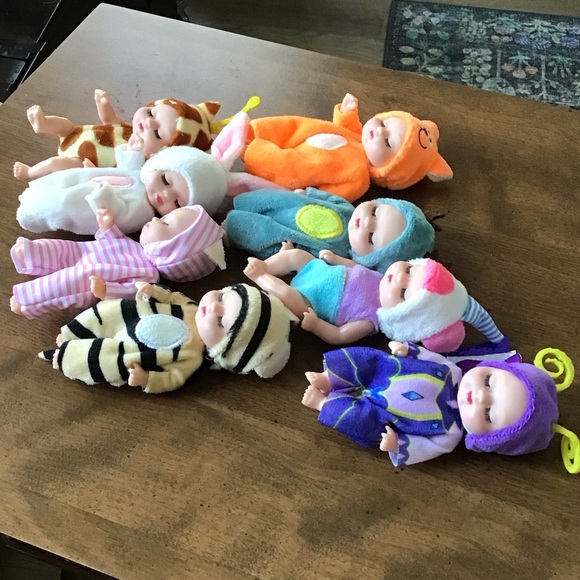 Keyohome Other - Keyohome Mini newborn baby dolls with animal-themed outfits. Set of 8